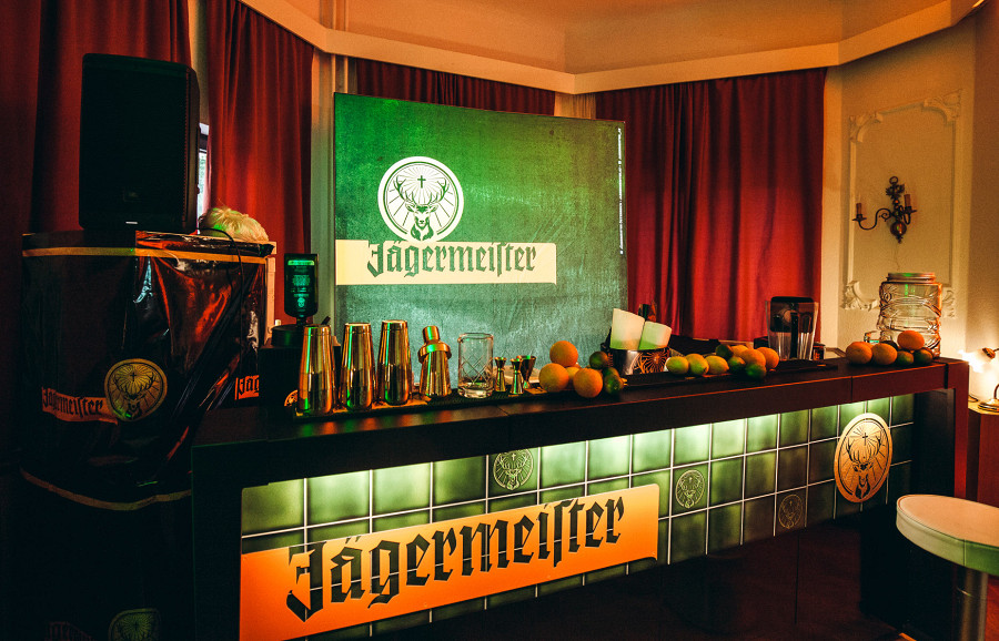 Illuminated promotion bar with back wall for Jägermeister